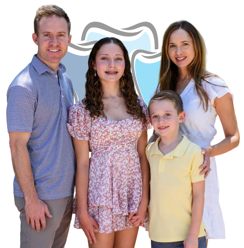 Smiling family of four—two adults and two children—posing together against a vibrant background, representing joy, togetherness, and the importance of oral health at every age.